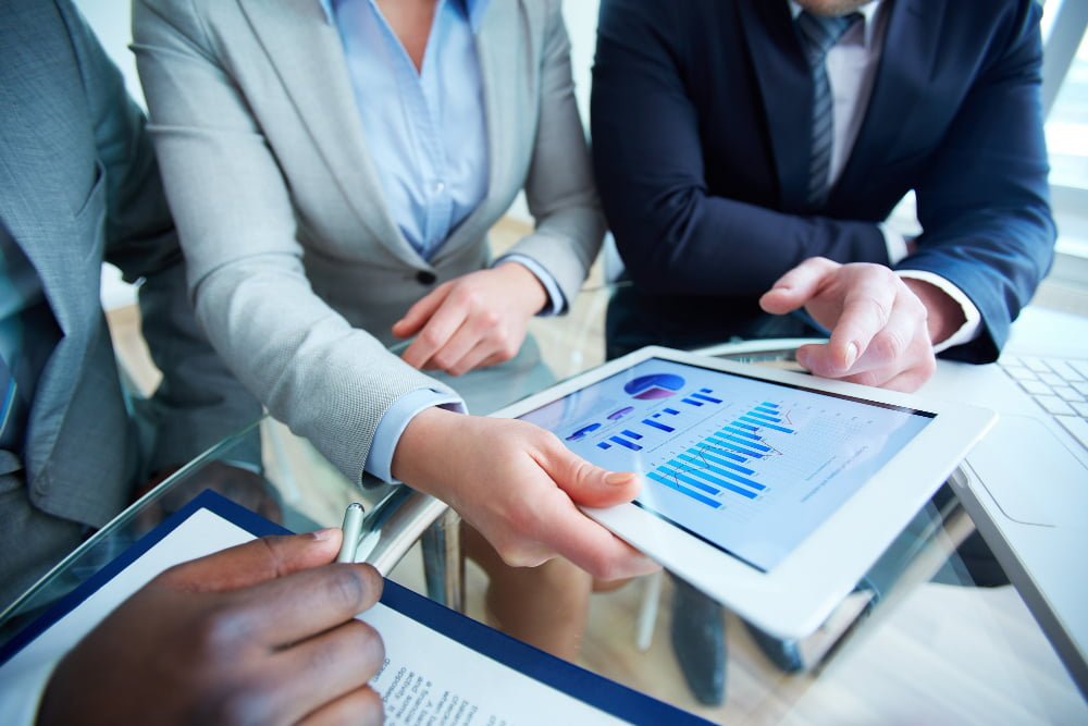 close-up-touchpad-executive-hands-during-meeting