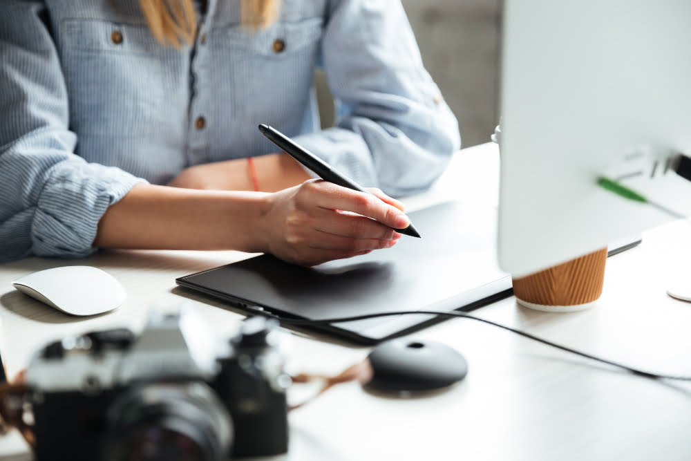 cropped-image-young-woman-work-office