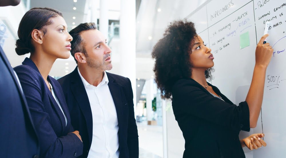 shot-group-businesspeople-having-brainstorming-session-modern-office